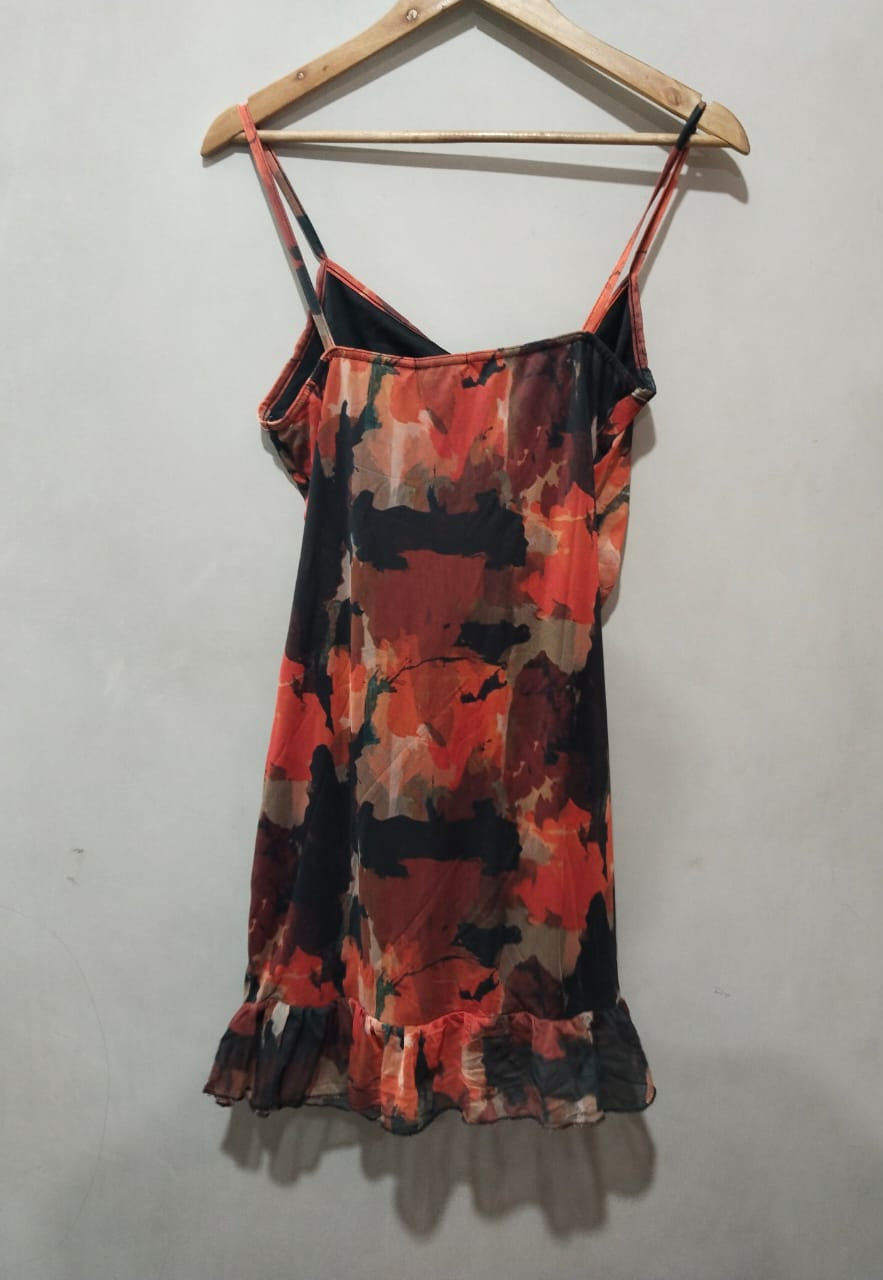PRETTY LITTLE THING Ruched Spaghetti Strap Mini Dress With A Floral Or Abstract Print