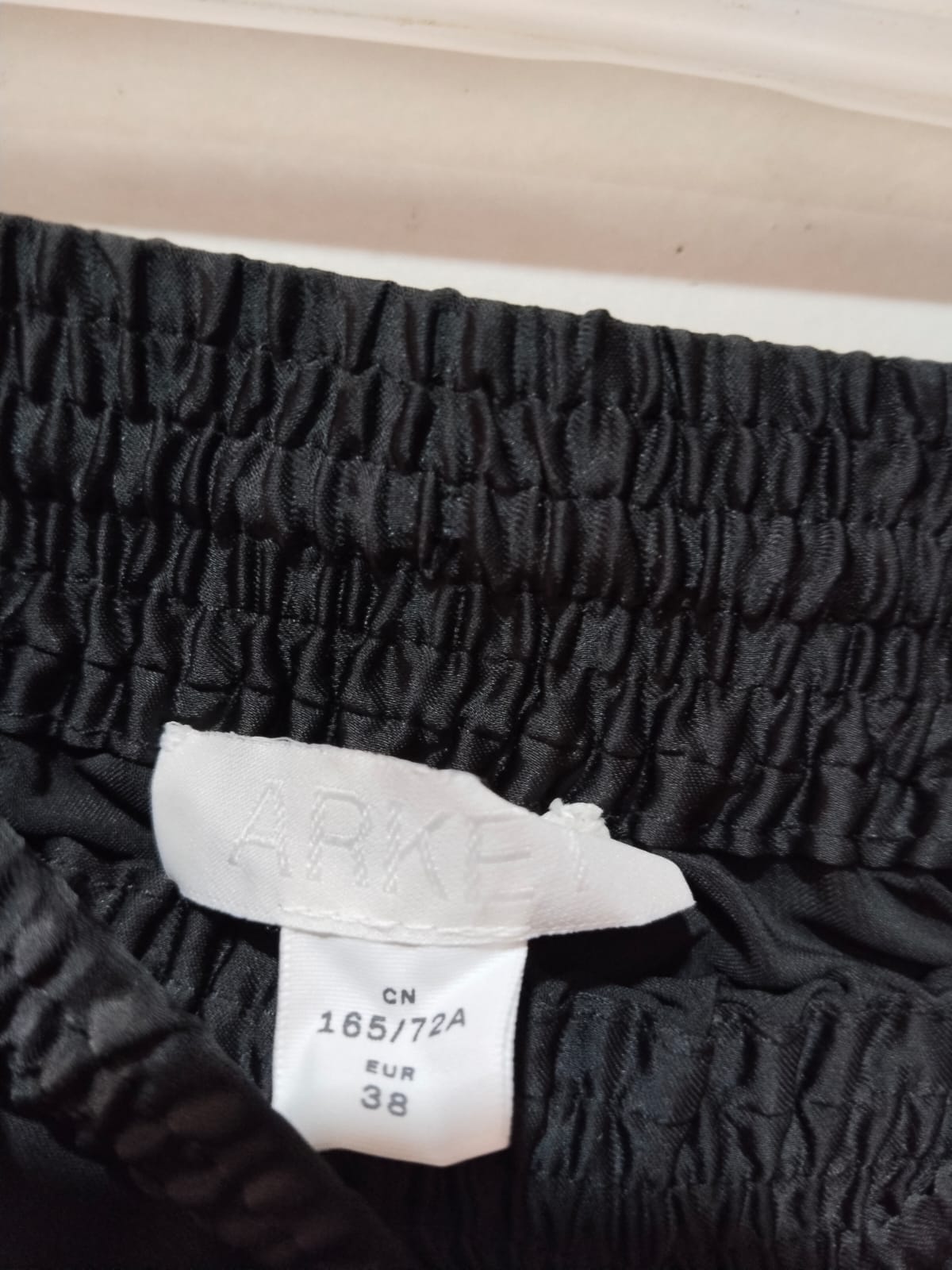 ARKET black satin long skirt with an elastic waistband