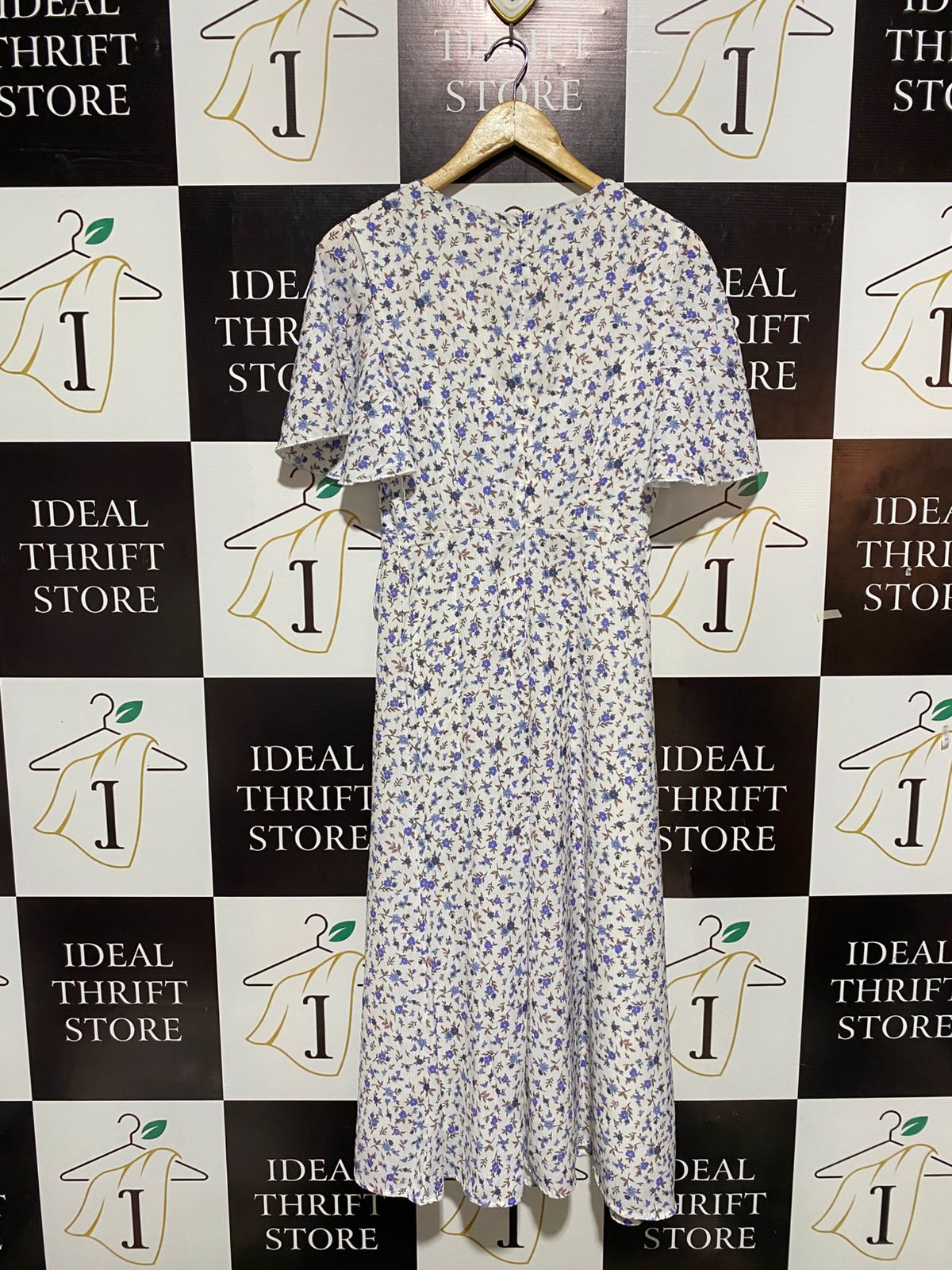 SHOWPO |M| BUST 15| C3| ELEGANT BLUE DAISY CUT-OUT TIE-FRONT MIDI DRESS