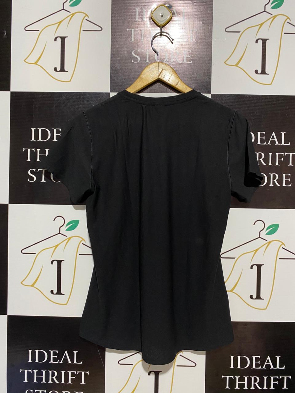 NEW BALANCE |M| BUST 18| SLEEK BLACK SHORT SLEEVE PERFORMANCE TOP WITH REFLECTIVE LOGO