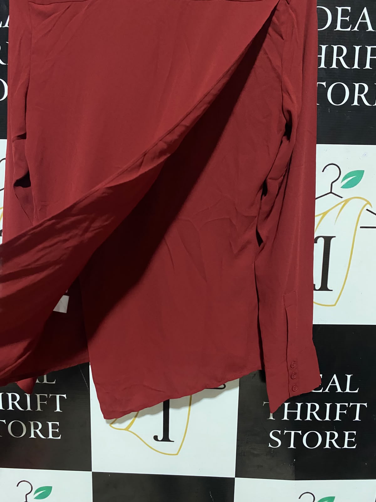 CUE |M| BUST 18| B35| DEEP RED LONG SLEEVE BUTTON-DOWN BLOUSE WITH CROSSOVER ASYMMETRIC HEM