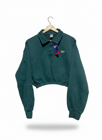 REEBOOK |S| BUST 21| WOMEN'S CROPPED POLO SWEATSHIRT IN FOREST GREEN