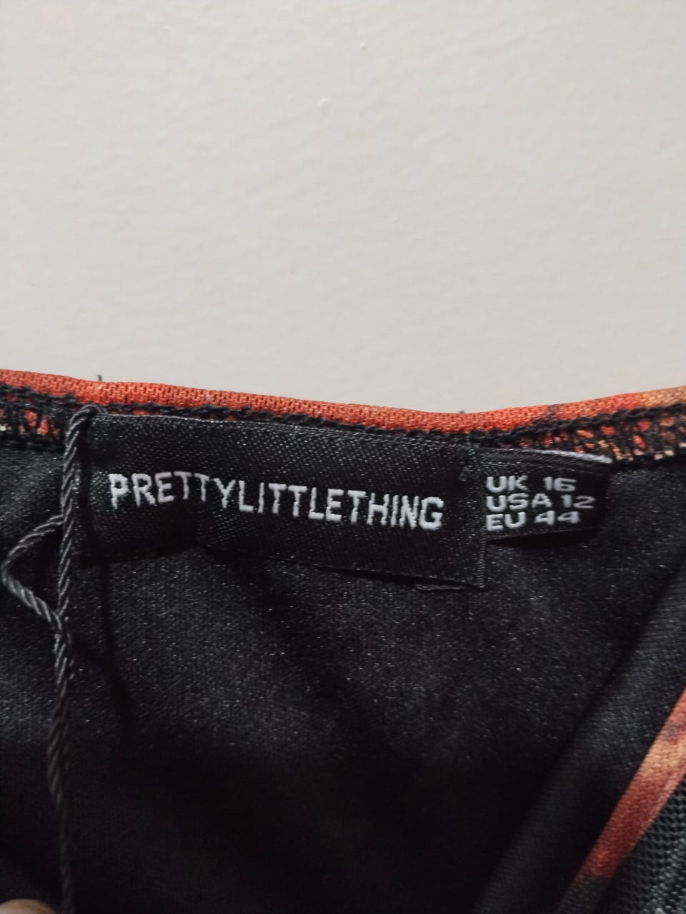 PRETTY LITTLE THING Ruched Spaghetti Strap Mini Dress With A Floral Or Abstract Print