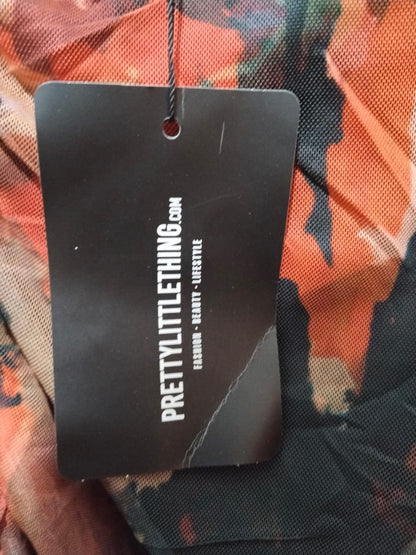 PRETTY LITTLE THING Ruched Spaghetti Strap Mini Dress With A Floral Or Abstract Print