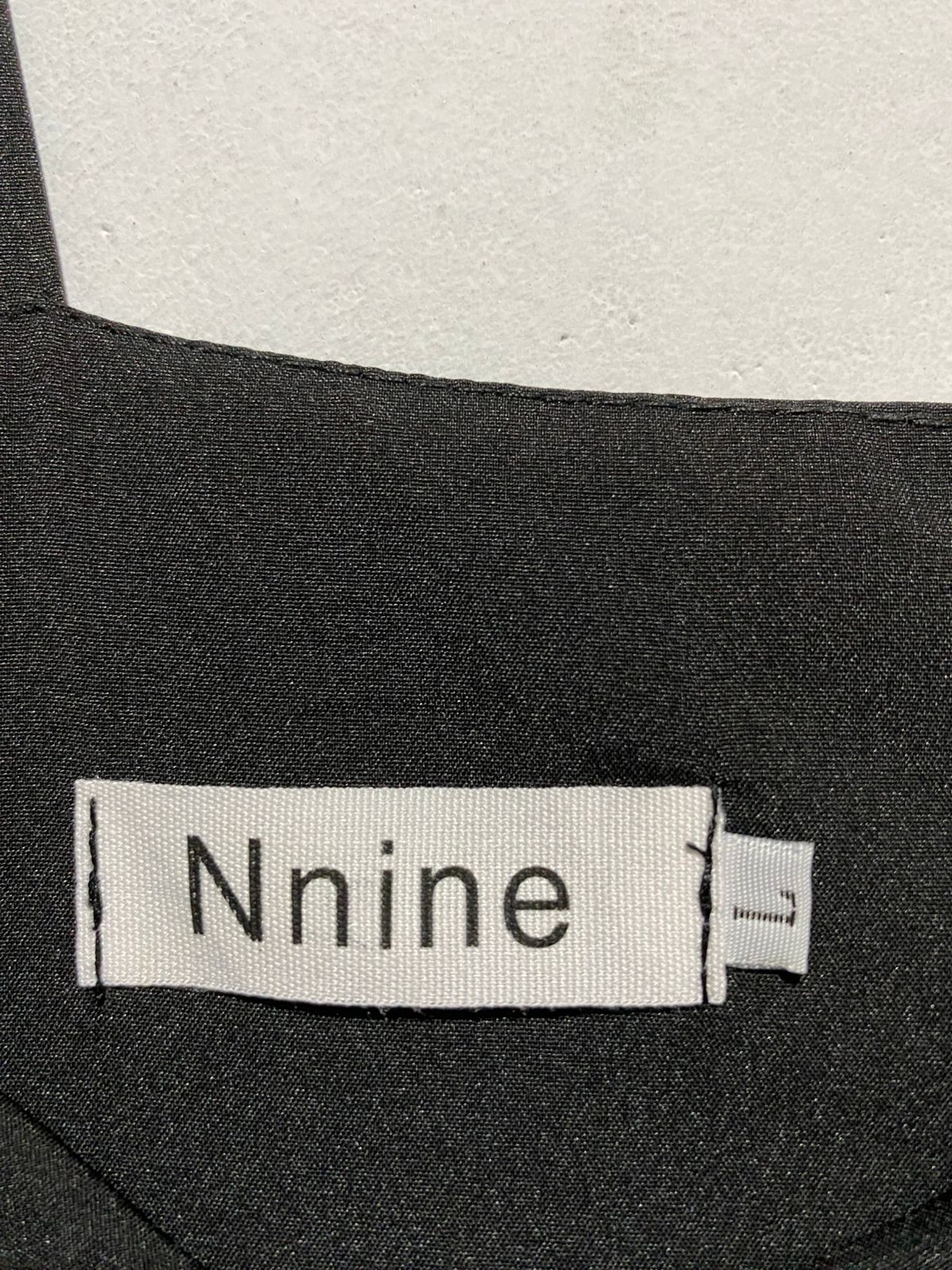 NNINE|L|BUST 17|BLACK WIDE-LEG JUMPSUIT WITH SIDE CUTOUTS