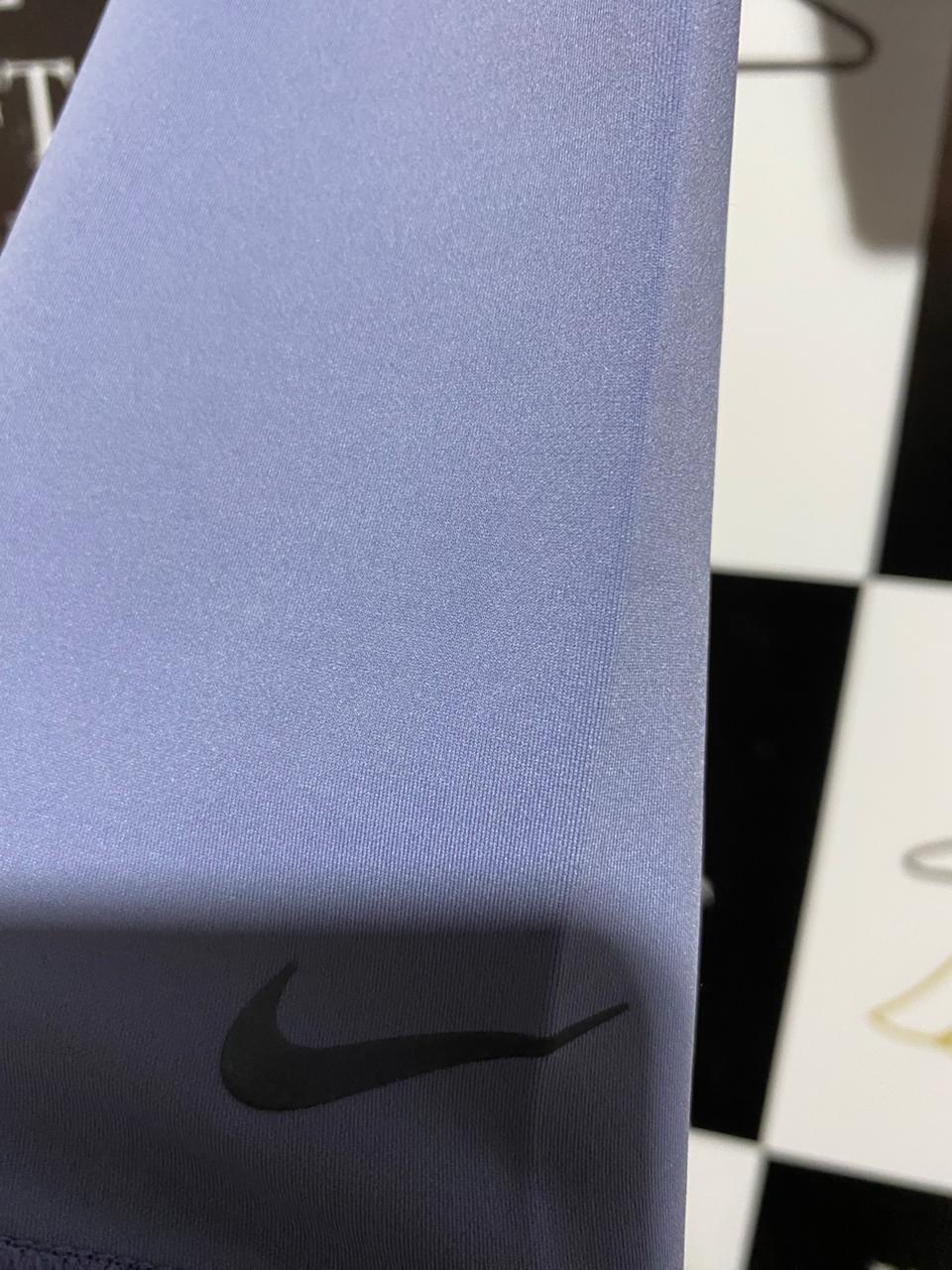 NIKE |M| BUST 16| Cropped Mock-Neck Performance Top in a light periwinkle or lavender blue