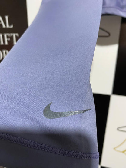NIKE |M| BUST 16| Cropped Mock-Neck Performance Top in a light periwinkle or lavender blue