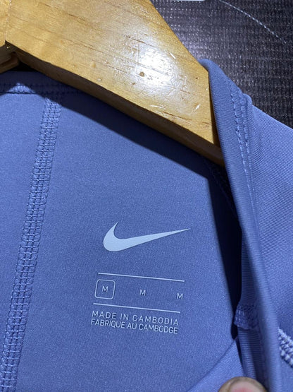 NIKE |M| BUST 16| Cropped Mock-Neck Performance Top in a light periwinkle or lavender blue