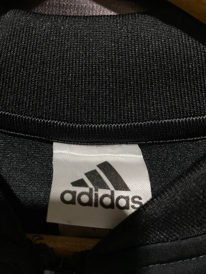 ADIDAS |S| BUST 17|B10|  Full-zip track jacket with a stand-up collar and the signature three white stripes on the shoulders and arms