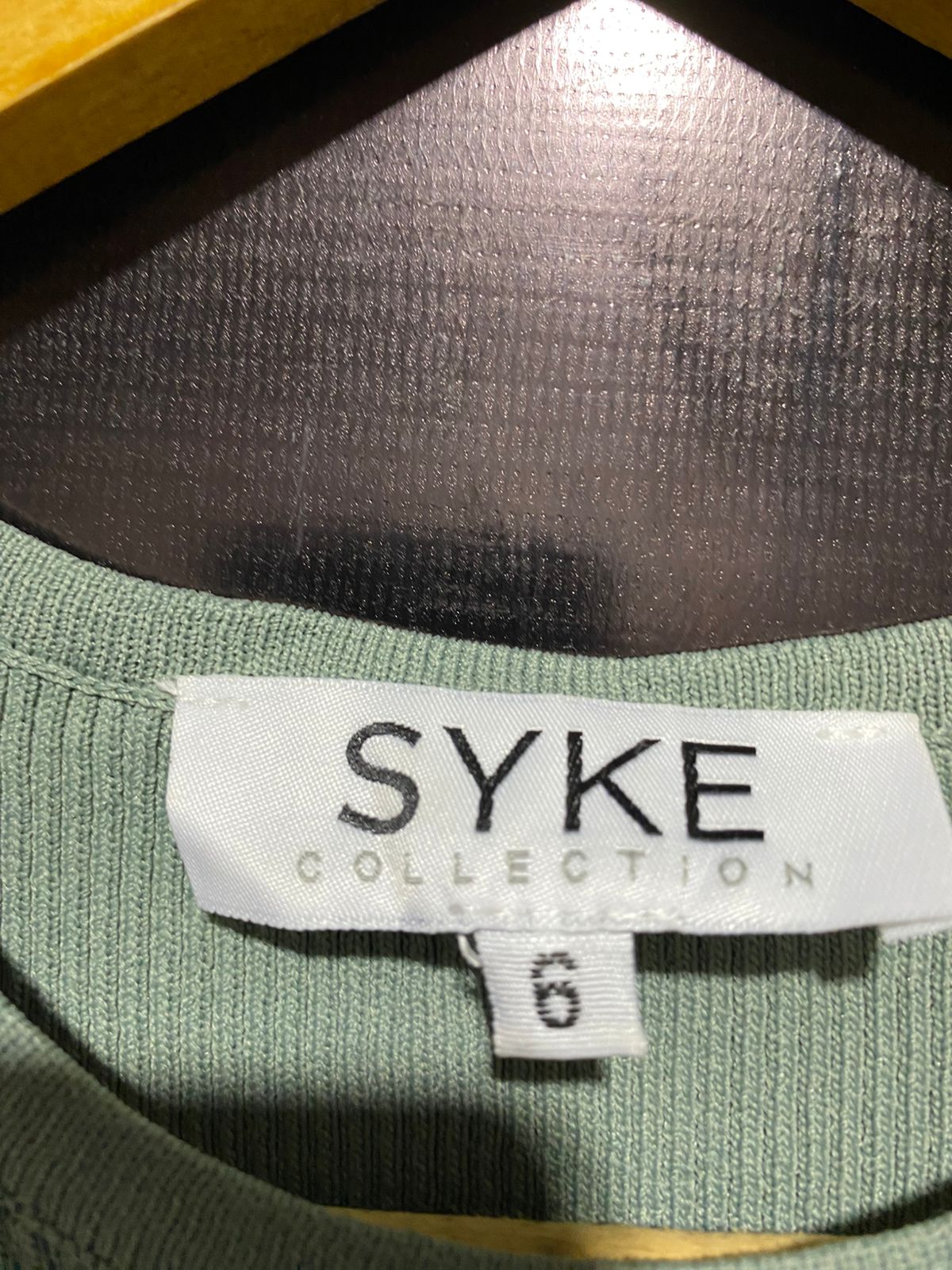 SYKE COLLECTION |M| BUST 9|  Sleeveless, fitted (bodycon) midi dress with a round crew neckline.