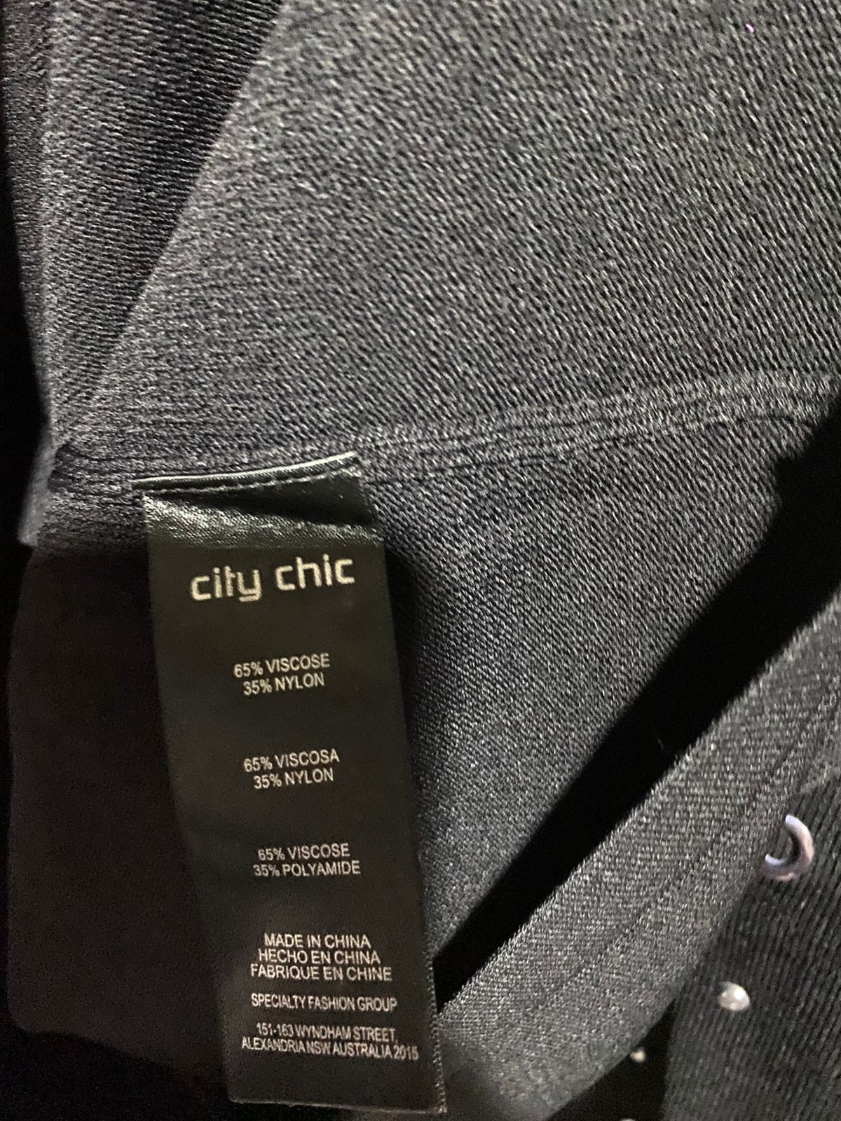 CITY CHIC |L| BUST 23| Black Long-Sleeve Sweater Featuring Silver Grommets or Studs