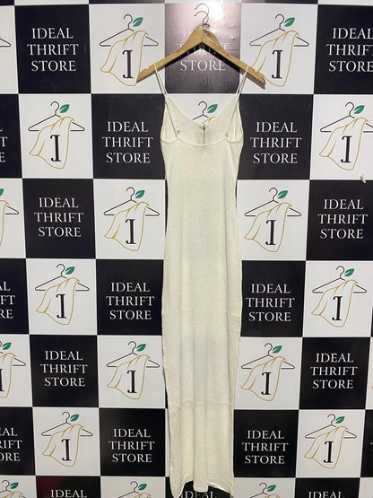 MESHKI |S| BUST 13| EXUDE MINIMALIST SOPHISTICATION IN THIS SLEEK, OFF-WHITE MAXI DRESS