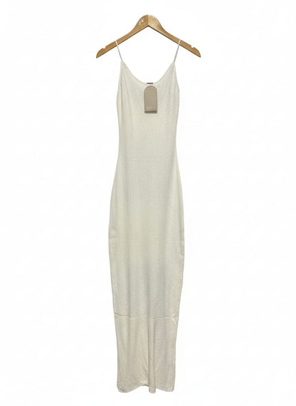 MESHKI |S| BUST 13| EXUDE MINIMALIST SOPHISTICATION IN THIS SLEEK, OFF-WHITE MAXI DRESS