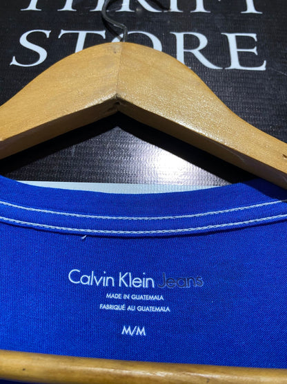 CALVIN KLEIN |M| BUSY 18| VIBRANT BLUE CREWNECK TEE FEATURING THE ICONIC CK MONOGRAM