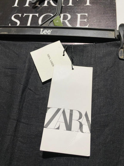 ZARA |L| WAIST 30| A STRIKING AND MODERN MID-LENGTH BLACK SKIRT FEATURING A DRAMATIC