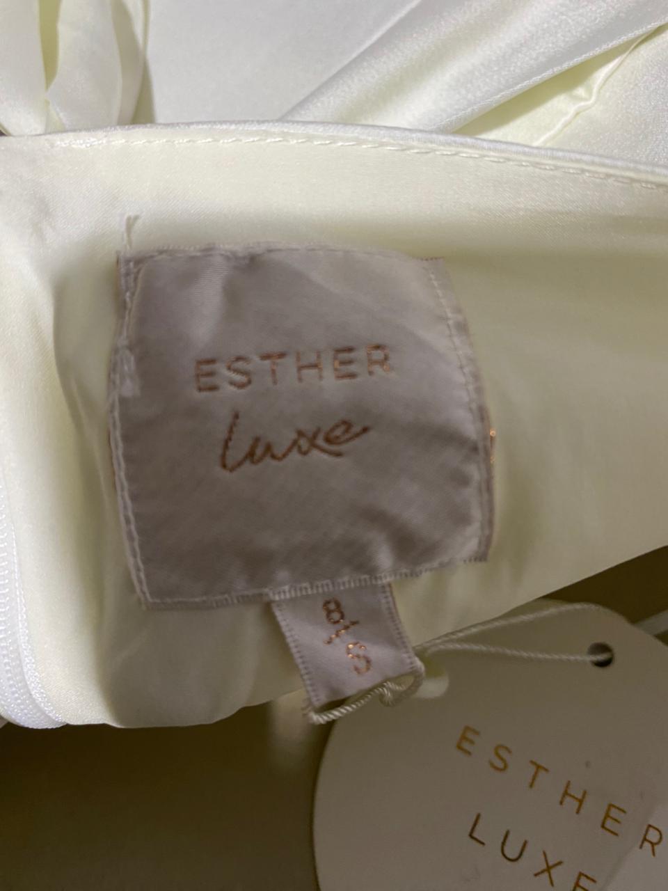 ESTHER LUXE |M| BUST 17| ELEGANT IVORY HALTER NECK MIDI DRESS WITH DRAMATIC HIGH-LOW HEMLINE
