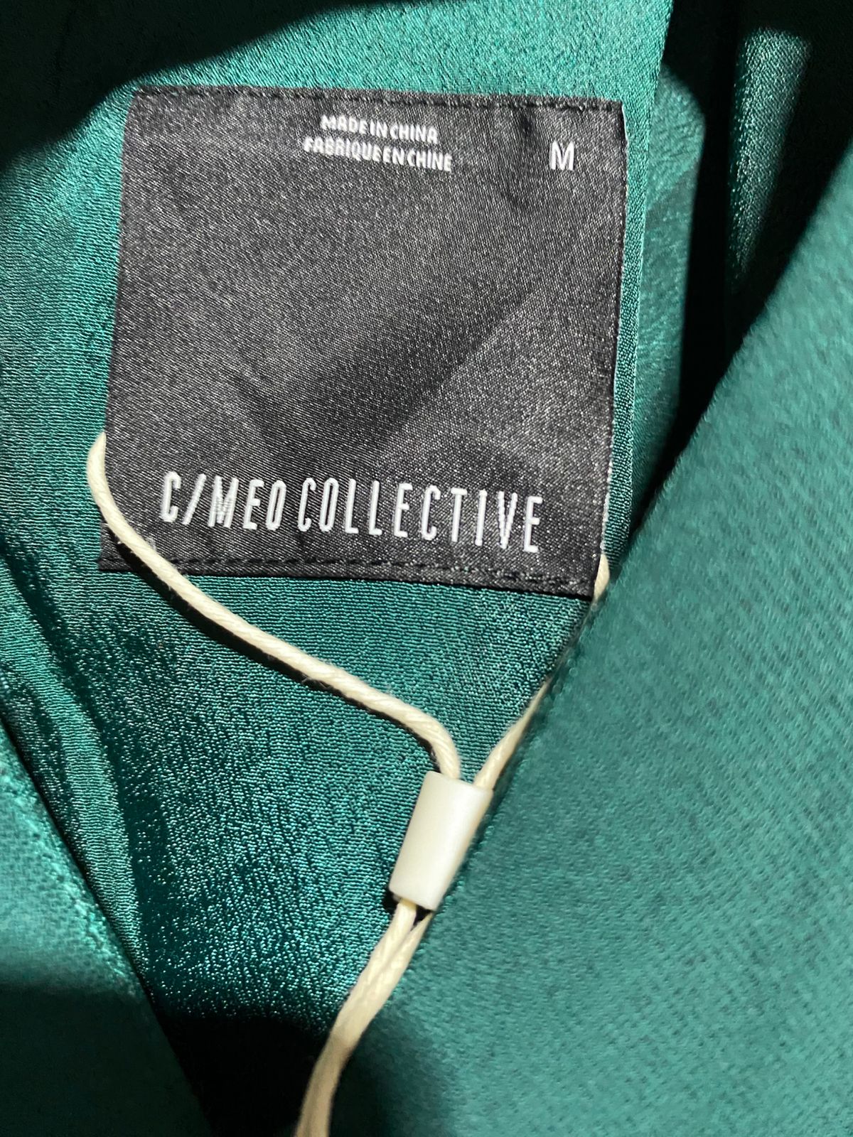 C|MEO COLLECTIVE |M| BUST 19| : EMERALD GREEN GEOMETRIC CUT-OUT BLOUSE