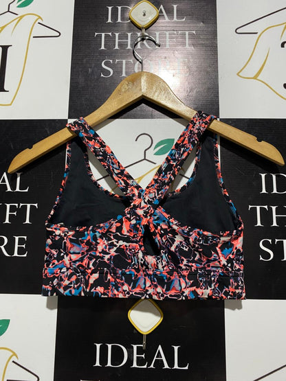 UNDER ARMOUR |S| BUST 12| MULTICOLOR ABSTRACT PRINT SPORTS BRA WITH CRISS-CROSS BACK