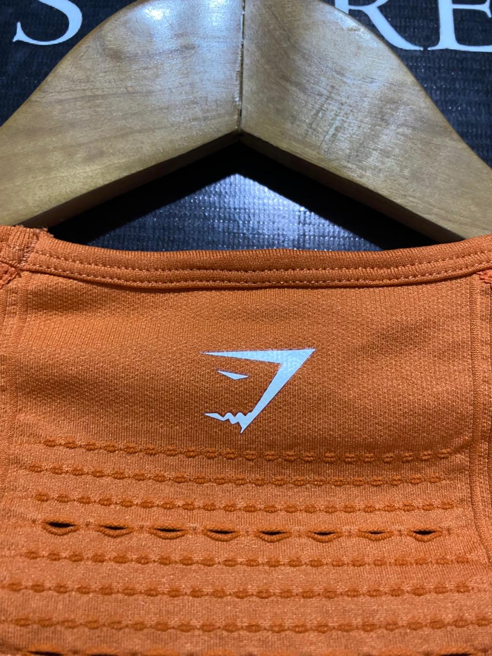 GYMSHARK |S| BUST 14| SEAMLESS ORANGE LONG SLEEVE CROP