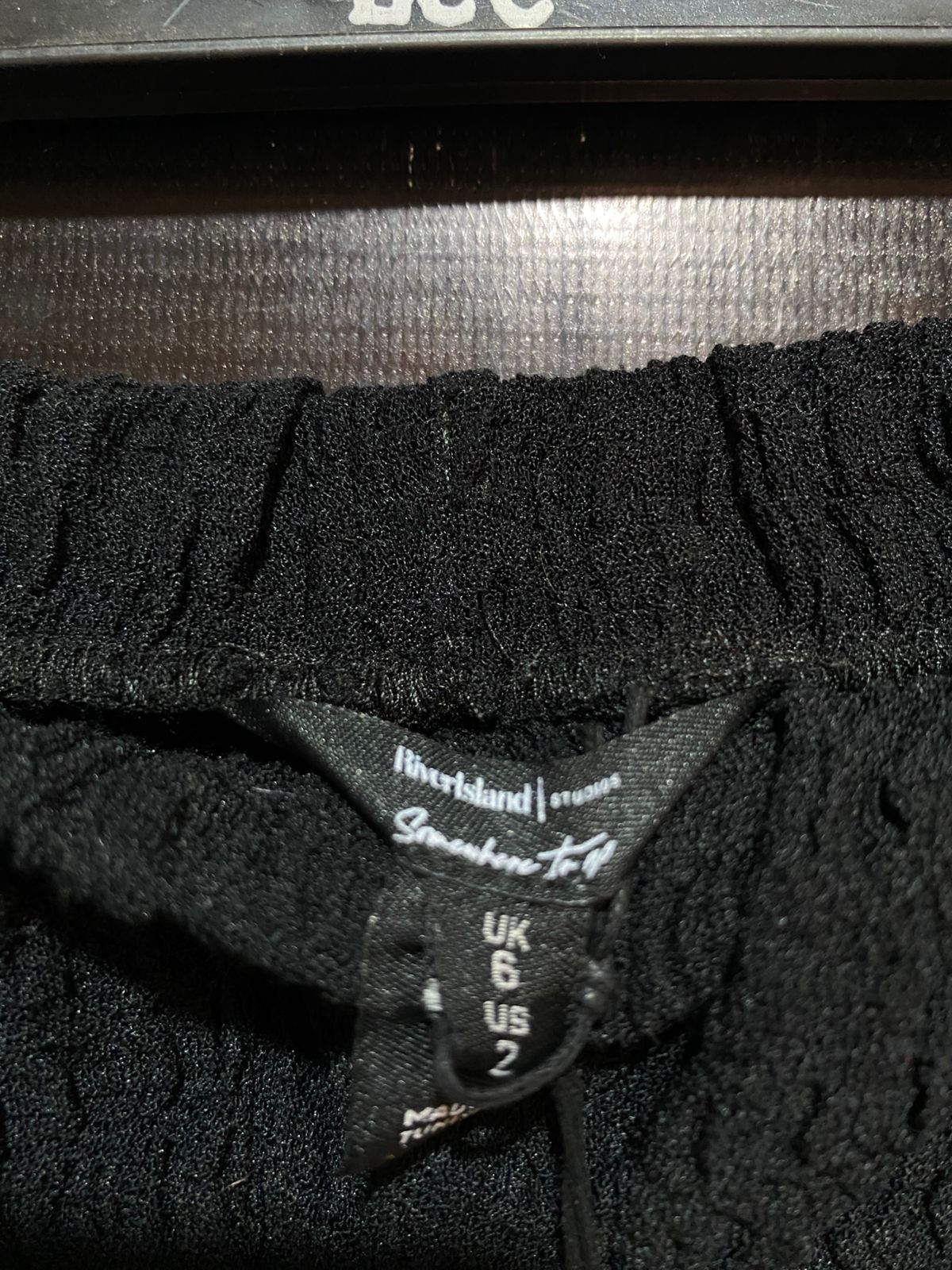 RIVER ISLAND |S| WAIST 26| B5| CHIC BLACK TEXTURED PLISSE FLARE PANTS NEW WITH TAGS