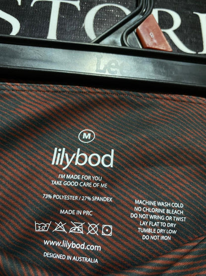 LILYBOD |M| WAIST 26| B23| PREMIUM HIGH-WAISTED RUST CAMO PERFORMANCE BIKER SHORTS