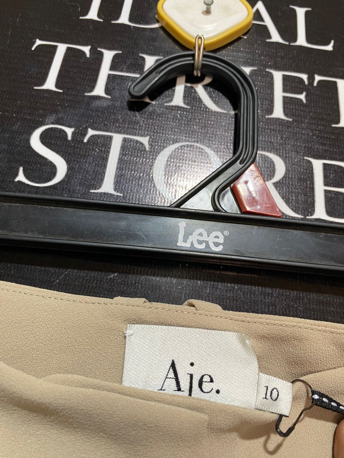 AJE |L| WAIST 30| B32| HIGH-WAISTED TAPERED TROUSERS WITH KNOTTED CUFFS