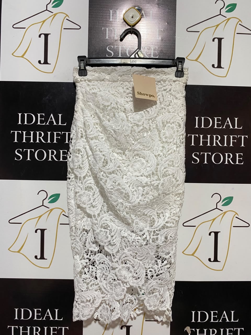 SHOWPO |XS| WAIST 25| B34| WHITE FLORAL LACE MIDI SKIRT WITH ASYMMETRICAL WRAP RUCHING DETAILED HEM