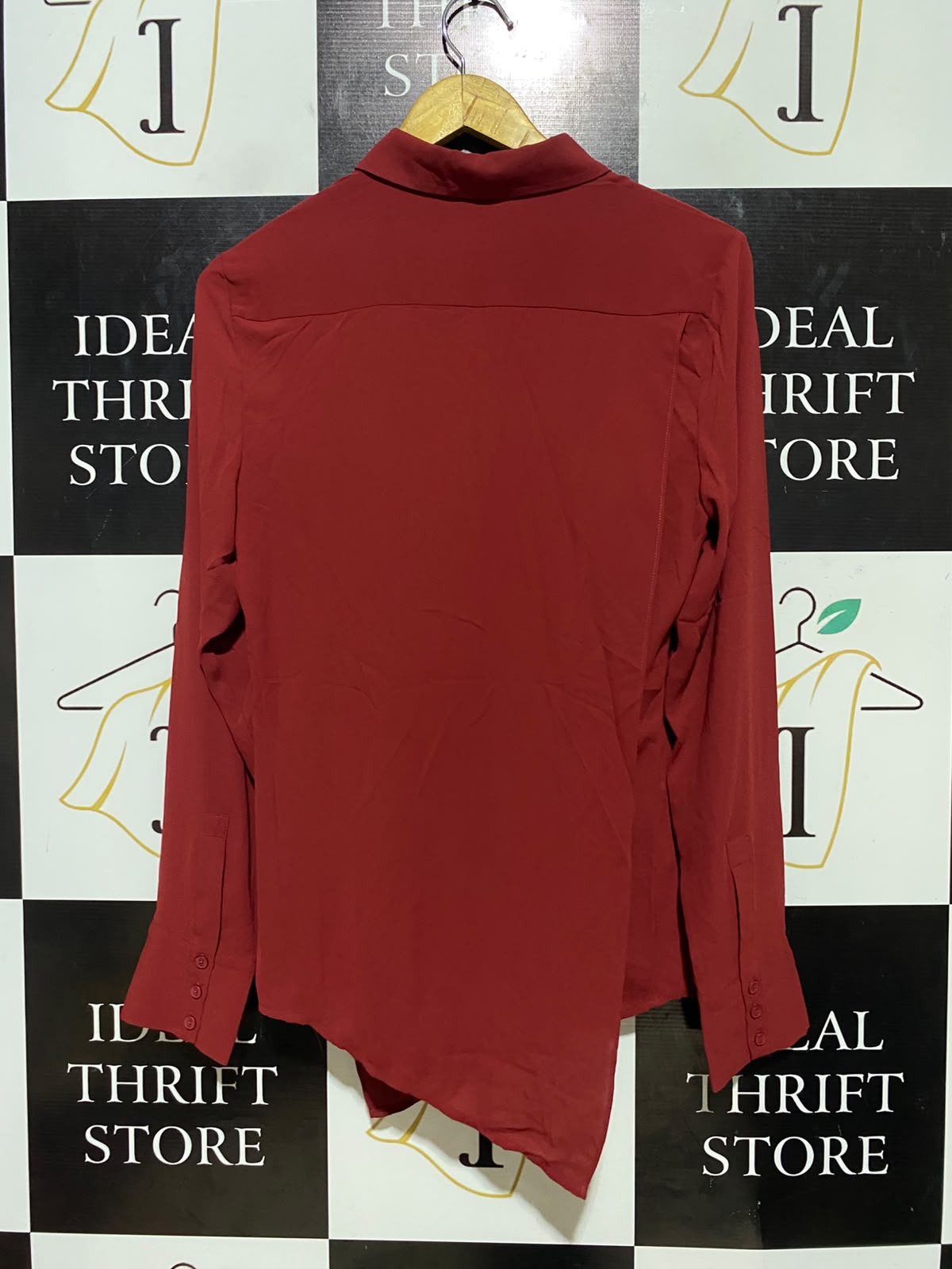 CUE |M| BUST 18| B35| DEEP RED LONG SLEEVE BUTTON-DOWN BLOUSE WITH CROSSOVER ASYMMETRIC HEM