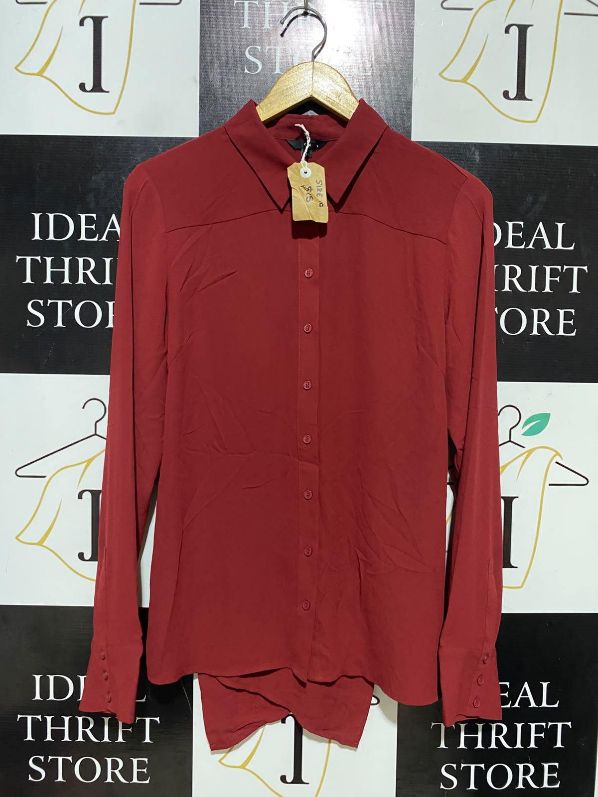 CUE |M| BUST 18| B35| DEEP RED LONG SLEEVE BUTTON-DOWN BLOUSE WITH CROSSOVER ASYMMETRIC HEM