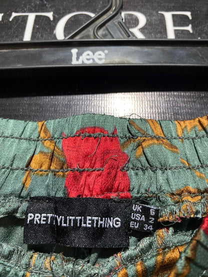 PRETTYLITTLE THING |XS| WAIST 24| B40| LUXURIOUS SAGE GREEN SILKY SATIN RED FLORAL TROUSERS