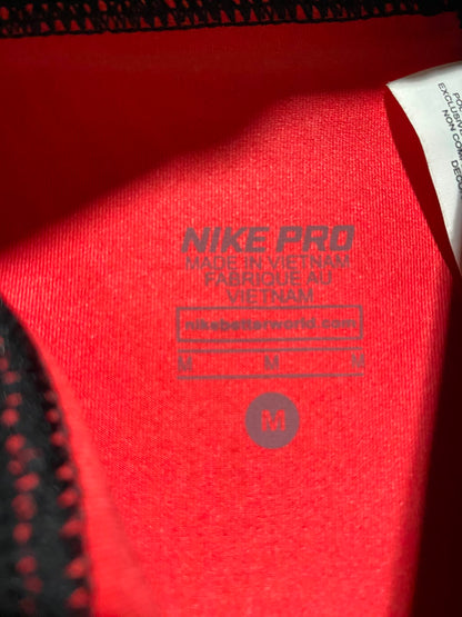 NIKE PRO |M| WAIST 25| B49| RED AND BLACK GEOMETRIC PRINT TRAINING TIGHTS