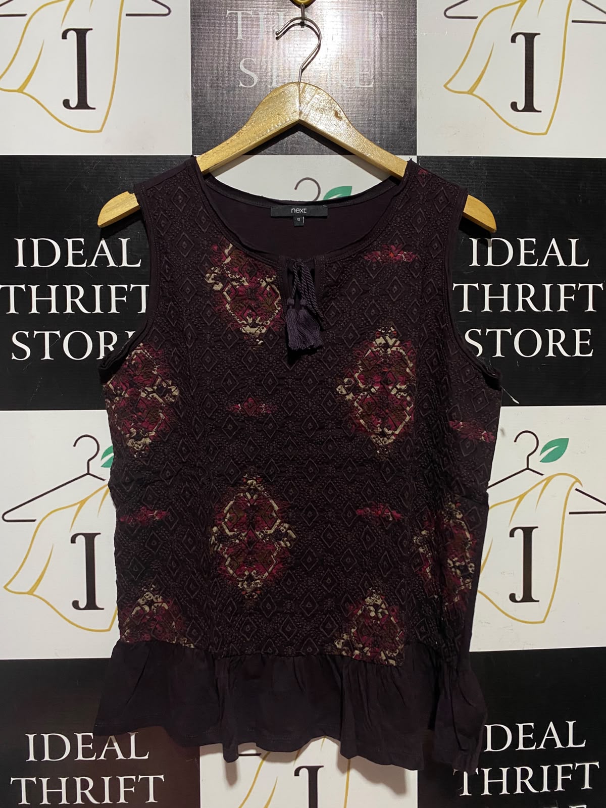 NEXT |M| BUST 19| A1| DEEP PLUM EMBROIDERED TASSEL NECK PEPLUM SLEEVELESS TOP