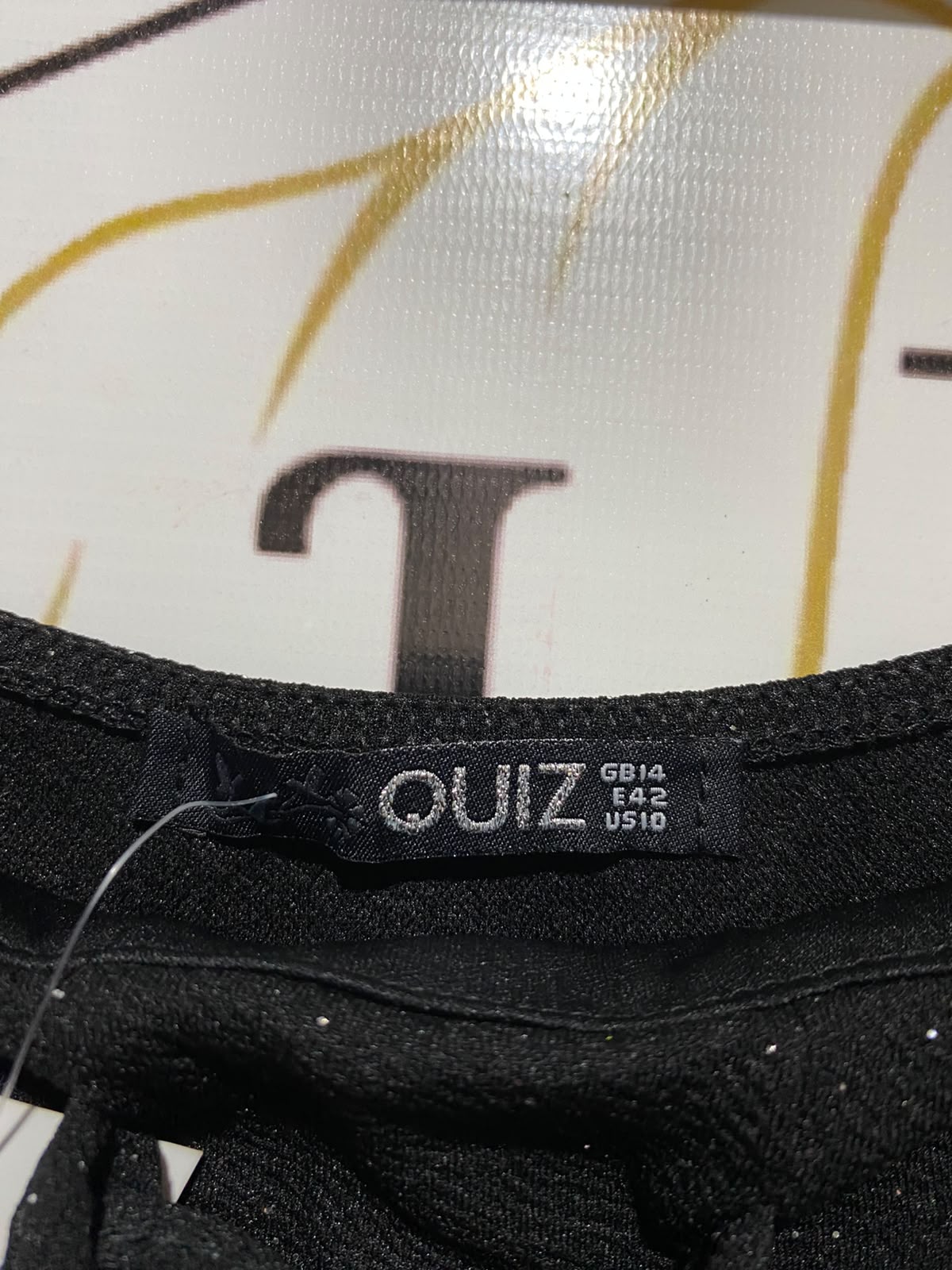 QUIZ |M| BUST 18| A11| LACE-UP FRONT GLITTER PEPLUM TOP - BLACK