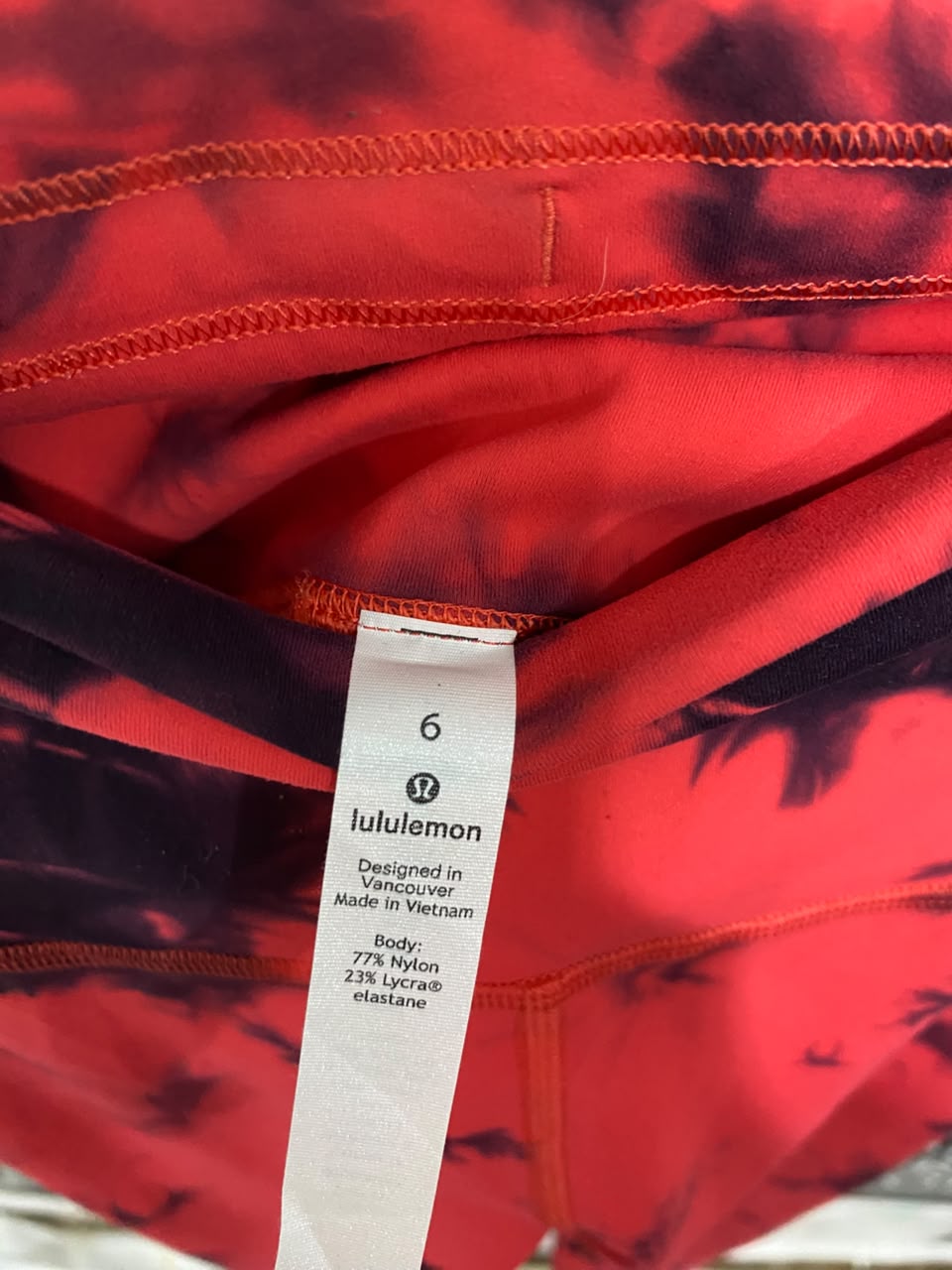 LULULEMON |XS| WAIST 22| WOMEN'S CORAL RED AND BLACK TIE-DYE HIGH-WAISTED ATHLETIC LEGGINGS