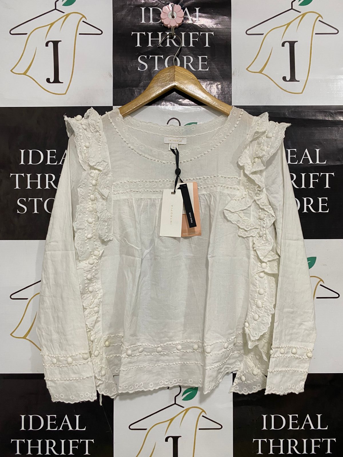 INTROPIA |M| BUST 19| A33| WHITE EYELET EMBROIDERED POM-POM RUFFLE-SHOULDER BLOUSE