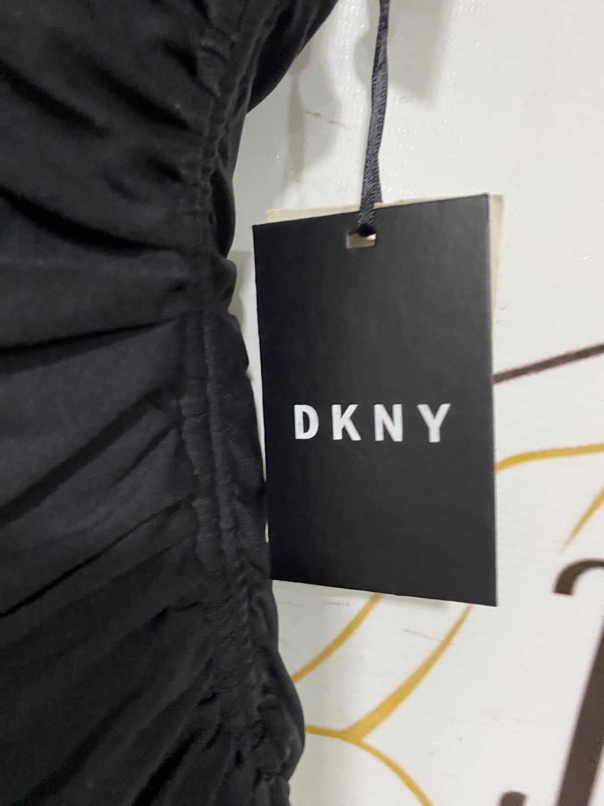 DKNY |S| BUST 15| A41| BLACK HALTER RUCHED UTILITY ONE-PIECE SWIMSUIT
