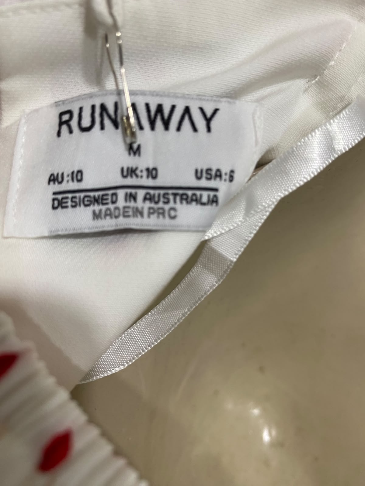 RUNWAY |M| BUST 15| A41| RED AND WHITE POLKA-DOT OFF-SHOULDER UTILITY CROP TOP