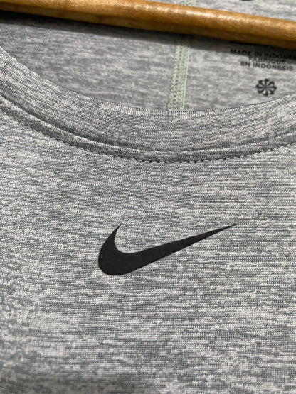 NIKE |L| BUST 21| A46| GREY HEATHERED DRI-FIT LONG-SLEEVE TECHNICAL UTILITY TOP