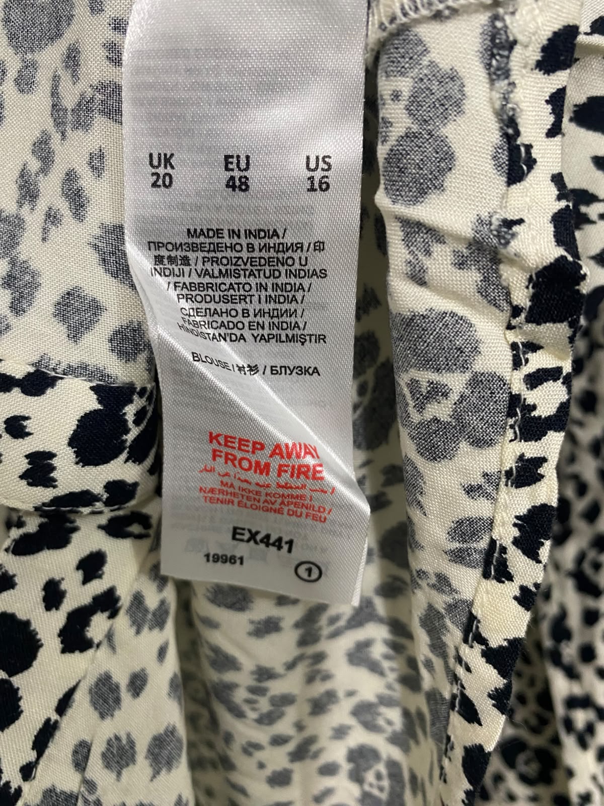 CAPSULE |XL| BUST 24| A53| BLACK AND WHITE ANIMAL-PRINT RUFFLE-COLLAR TECHNICAL UTILITY BLOUSE