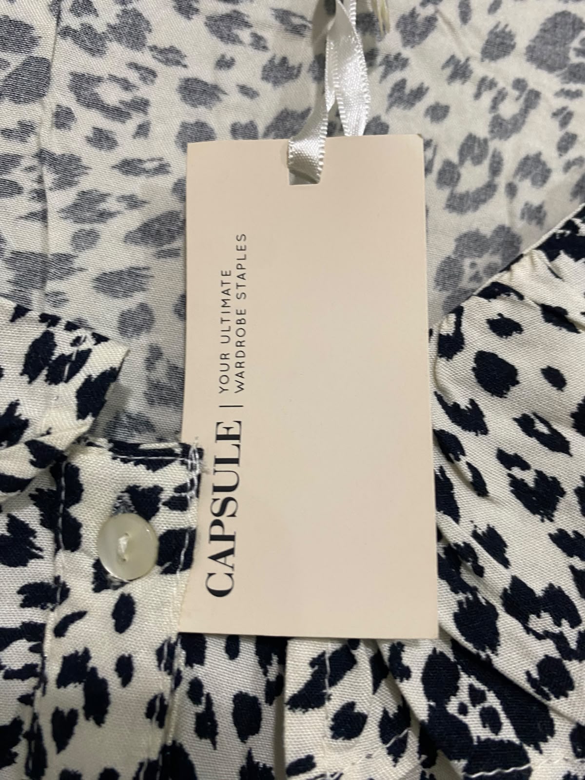 CAPSULE |XL| BUST 24| A53| BLACK AND WHITE ANIMAL-PRINT RUFFLE-COLLAR TECHNICAL UTILITY BLOUSE