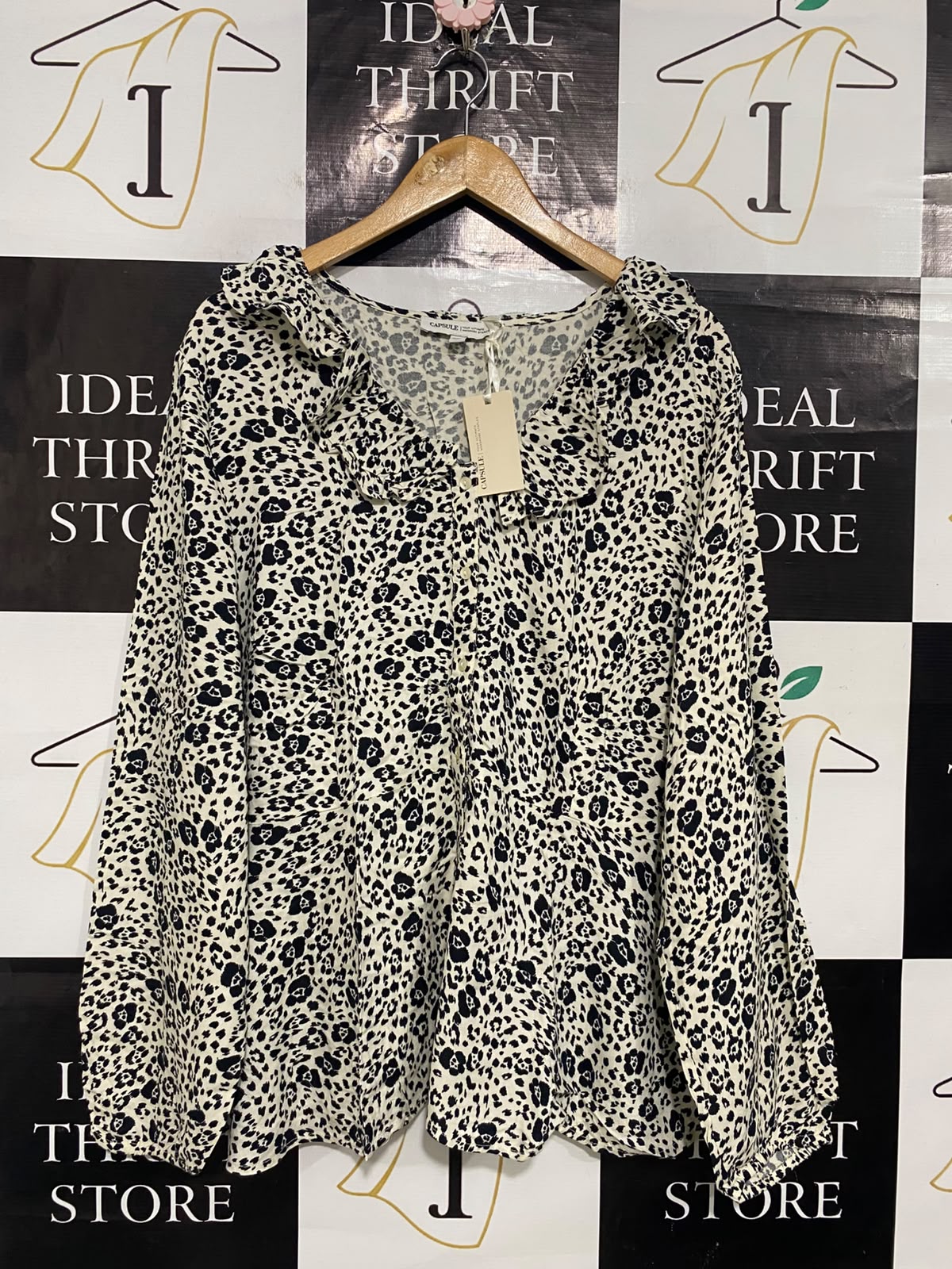 CAPSULE |XL| BUST 24| A53| BLACK AND WHITE ANIMAL-PRINT RUFFLE-COLLAR TECHNICAL UTILITY BLOUSE