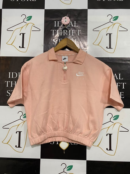 NIKE |L| BUST 21| A55| PEACH SHORT-SLEEVE HALF-ZIP TECHNICAL UTILITY CROP TOP