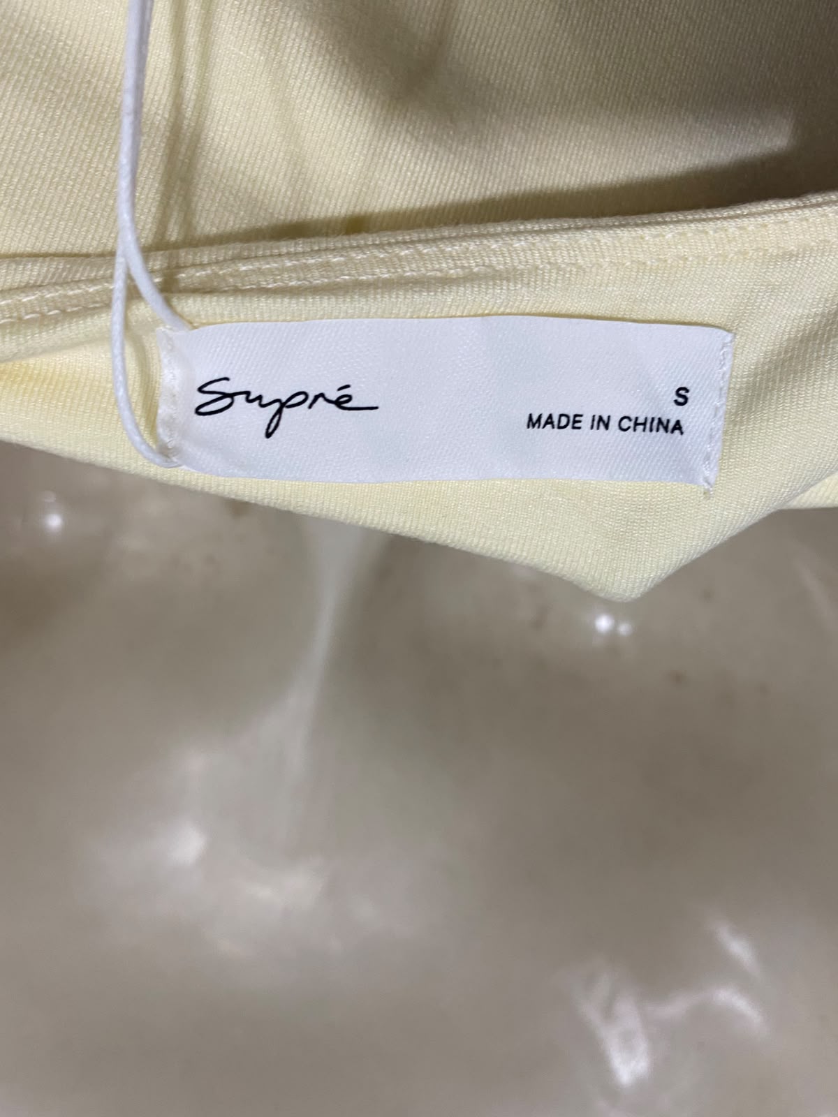 SUPRE |S| BUST 15| A56| PALE YELLOW O-RING HALTER TECHNICAL UTILITY TOP