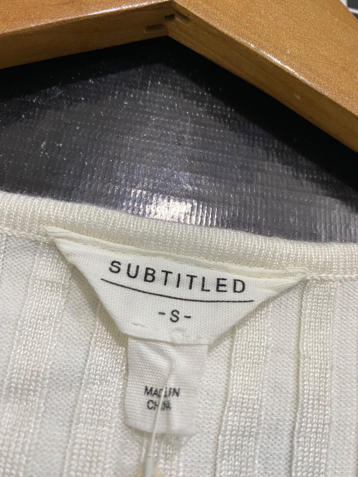 SUBTITLED |S| BUST 12| A58| OFF-WHITE RIBBED-KNIT V-NECK BELTED TECHNICAL UTILITY MIDI DRESS
