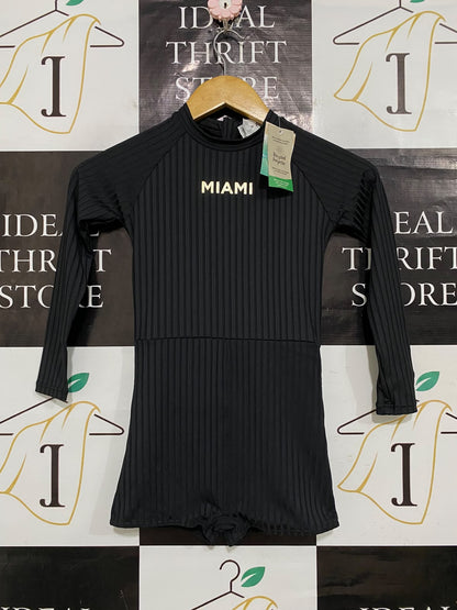 WAVE ZONE |S| BUST 12| A58| BLACK LONG-SLEEVE RIBBED TECHNICAL UTILITY PLAYSUIT