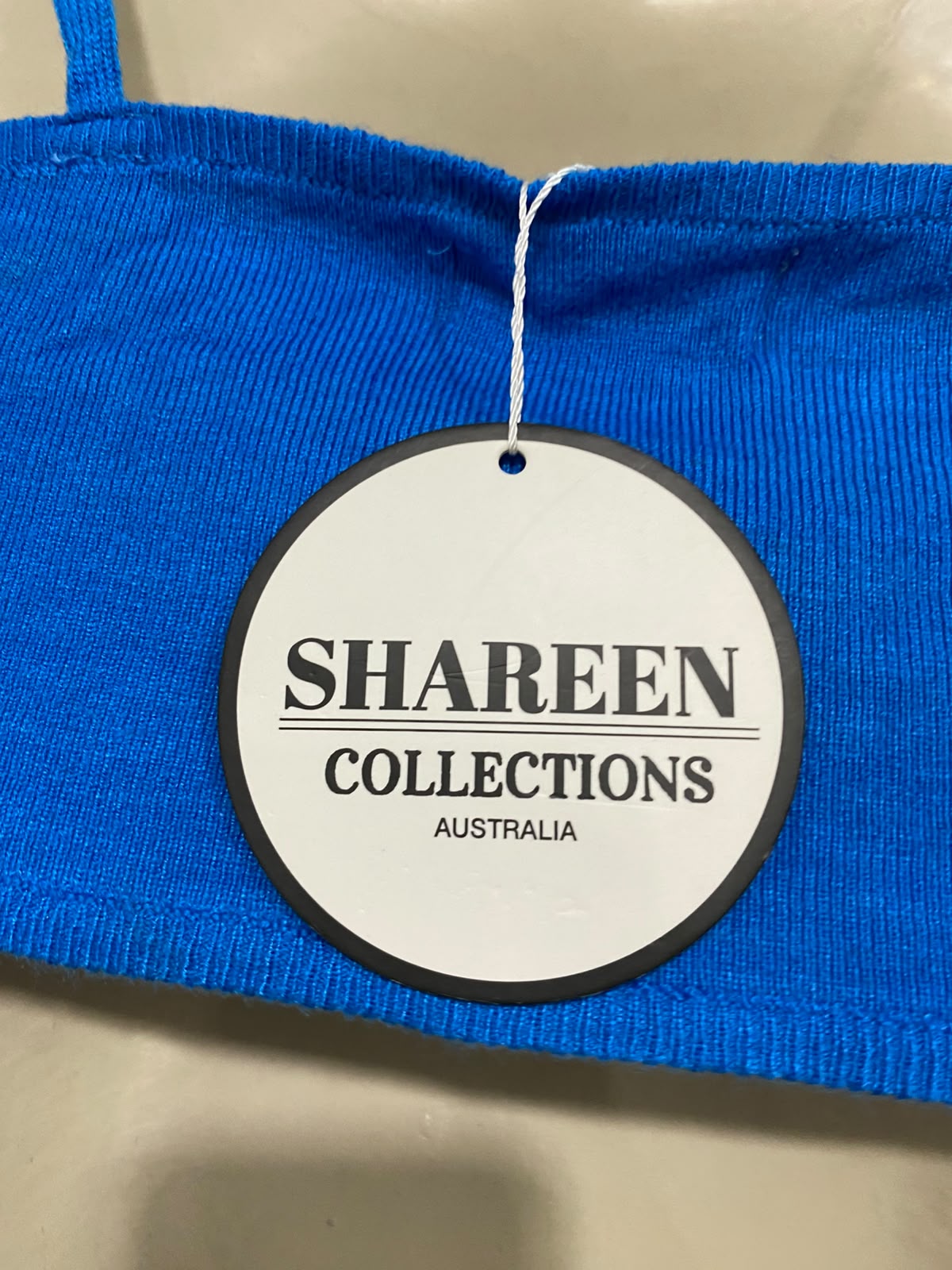 SHAREEN |S| BUST 15| A59| BLUE CUT-OUT KNOT-FRONT TECHNICAL UTILITY MIDI DRESS