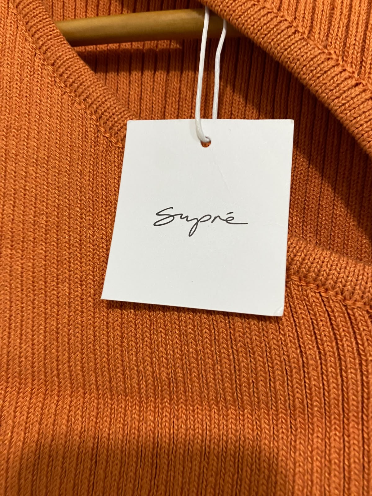 SUPRE |S| BUST 11| A62| ORANGE ASYMMETRIC CUTOUT TECHNICAL UTILITY TANK TOP