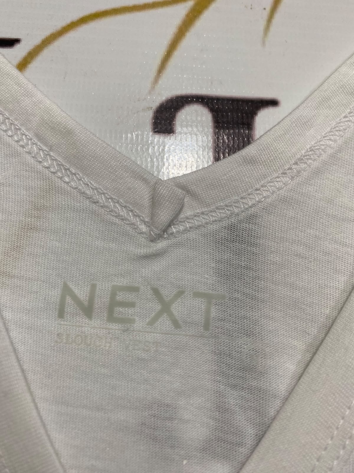 NEXT |M| BUST 19| A67| WHITE V-NECK ESSENTIAL TANK TOP