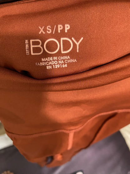 COTTON ON |XS |  WAIST 22  |A71 |  BODY RUST HIGH-RISE FLARED ACTIVE TROUSERS
