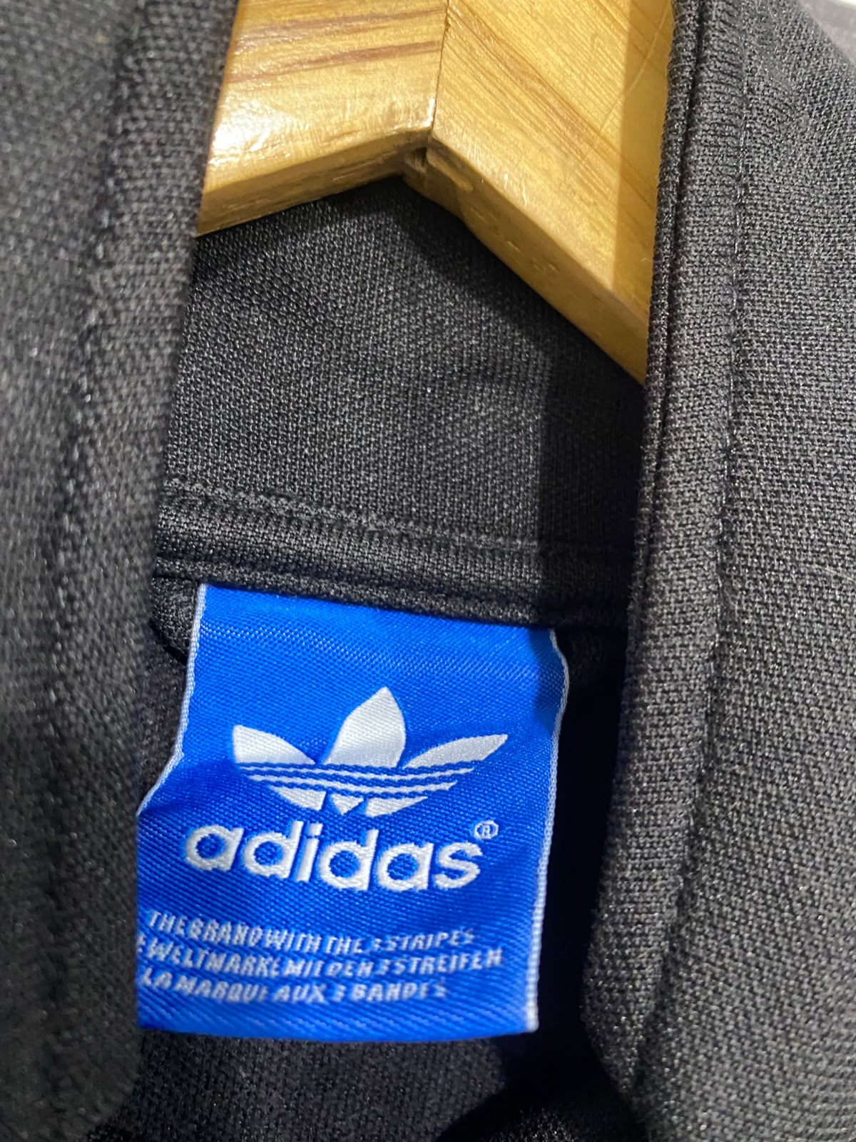 ADIDAS |M | BUST 21 | A75 | BLACK THREE-STRIPE ZIP-UP TRACK JACKET
